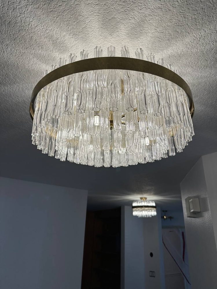 Crystal chandelier assembled and hung from an existing ceiling box