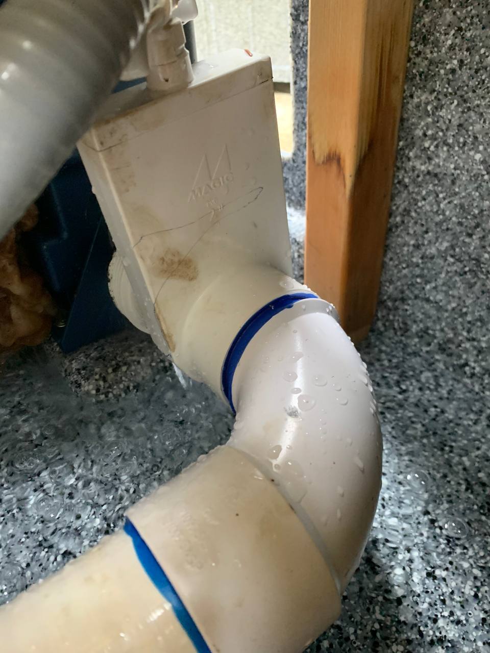 Cracked two inch PVC union leaking water inside a hot tub cabinet