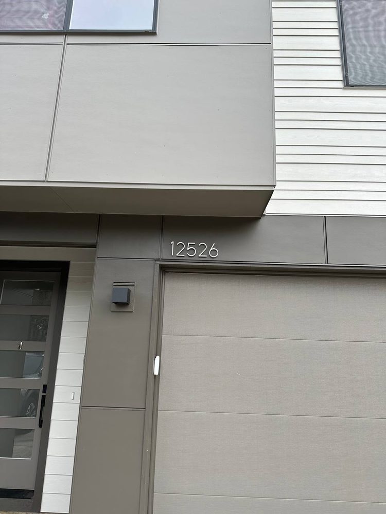 Video doorbell mounted beside a front entry